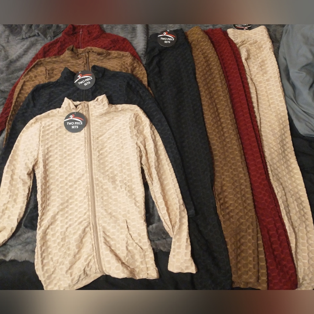 Four 2 piece tracksuits